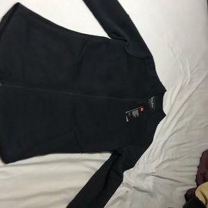 Fitted under armor jacket.